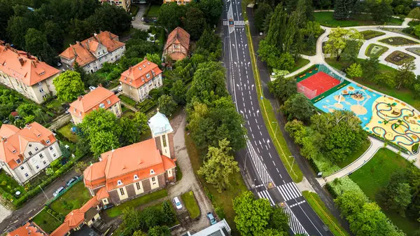 stock image Aerial View of Residential Area With Playgrounds and Roads in Summer