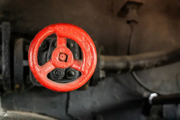 stock image Detailed view of red valve in steam locomotive engine compartment