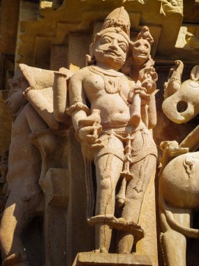 Khajuraho, milletvekili, Hindistan - 11, 30, 2013: Madhya Pradesh, Hindistan 'daki Khajuraho tapınaklarının karmaşık oymaları