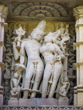 Khajuraho, milletvekili, Hindistan - 11, 30, 2013: Madhya Pradesh, Hindistan 'daki Khajuraho tapınaklarının karmaşık oymaları
