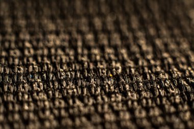 Kalıplı kahverengi kumaş sergilenen vintage desenler ve dokuma tasarım elementlerinin ayrıntılı görünümü