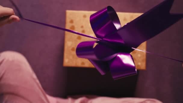 Top Shot Girls Hands Tightening Ribbon Putting Gift Box — Stock Video