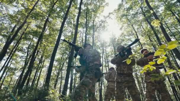 Low Angle View Military Squad Standing Circle Forest Looking Themselves — Stock Video