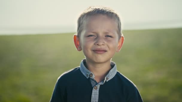 Carefree Eastern European Boy Blond Hair Blue Eyes Smiles Close — стоковое видео
