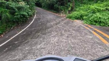 Dramatic lush tropical jungle and volcanic mountain views on Camiguin Island Philippines, captured as travel and tourism content for vacation and backpacking media