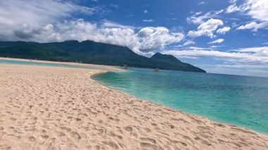 Point of view perspective of tropical beach, clear blue waters and white sand, Asian Philippines White island Camiguin, vacation holiday tourism 