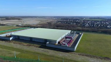 Aerial view of state of the art data centre, information storage and cooling turbines fans energy air conditioning, cloud IT, England UK