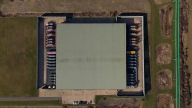 Aerial view of state of the art data centre, information storage and cooling turbines fans energy air conditioning, cloud IT, England UK