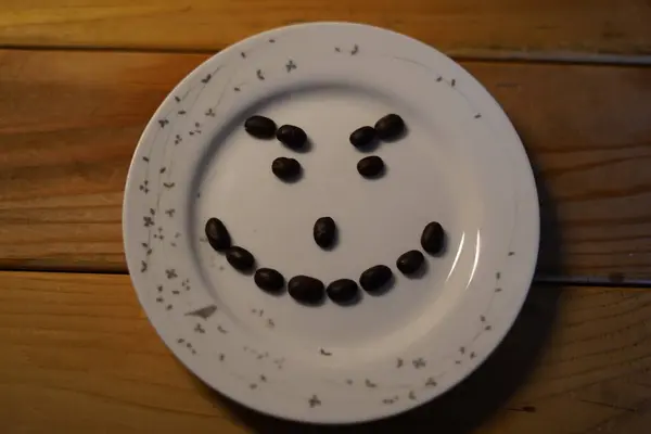 Coffee bean art, smiley face