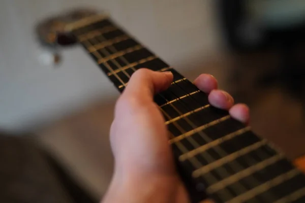 Close up of hand, hand playing guitar, hand, music, playing instrument, body part, playing, fingers, strings,