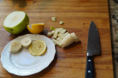 Meyve doğrama, şarküteri tahtası, meyve, atıştırmalık, sağlıklı beslenme, bıçak, kesme, meyve, yiyecek, yiyecek, yiyecek, erzak, sağlık malzemeleri.