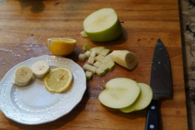 Meyve doğrama, şarküteri tahtası, meyve, atıştırmalık, sağlıklı beslenme, bıçak, kesme, meyve, yiyecek, yiyecek, yiyecek, erzak, sağlık malzemeleri.