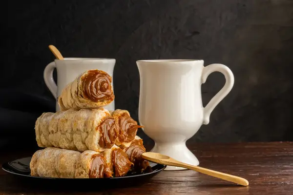 Arjantin tatlısı, dulce de leche olarak adlandırılan, genellikle atıştırma zamanında yenen..