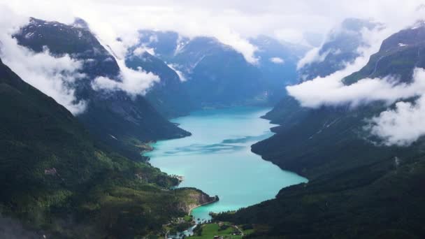 Tall Norwegian Mountains Lovatnet Valley Surrounding Clouds Towering Bright Blue — Stock Video