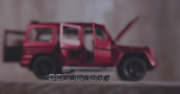Inscription Insurance Cubes Red Car Miniature — Stok Video