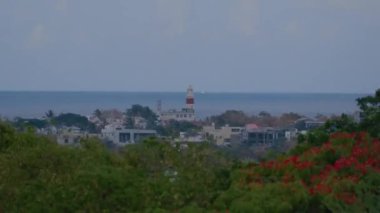 Mauritius 'taki Deniz fenerinin Zamanı, adanın manzarası.
