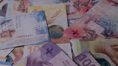 İsviçre Frangı Farklı mezhepler, Yakın plan Arkaplan