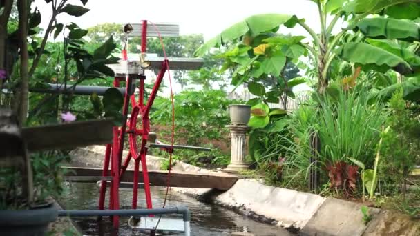 Waterwheel Spinning Canal Garden Made Used Materials Painted Red — Stock Video