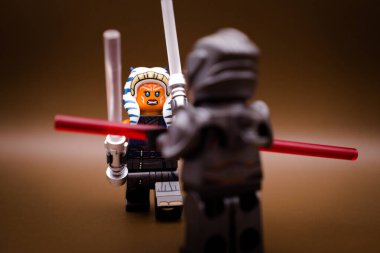 Warsaw, Poland, September 25 2023.Ahsoka Tano fighting with Marrok.Lego Star Wars minifigures and all other bricks are made by THE LEGO GROUP. clipart