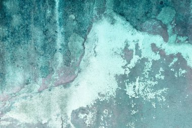 Tozlu, arkaplan boyası, lekeli ve çatallı beton bir duvarın dokusu.