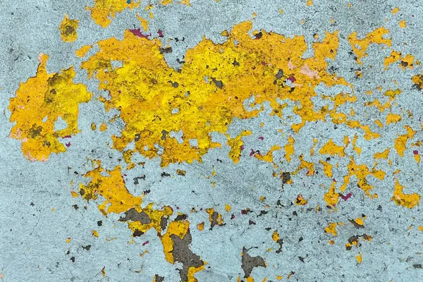 Colorful peeling paint floor background, texture of a multicolor old wall
