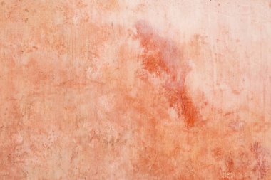 Pembe boyayla kaplı eski kırsal duvarın Grunge arkaplan dokusu