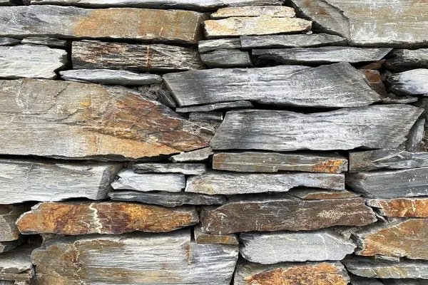 Background of stone wall texture. Old stone wall texture background for design.