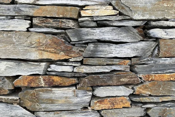 Background of stone wall texture. Old stone wall texture background for design.
