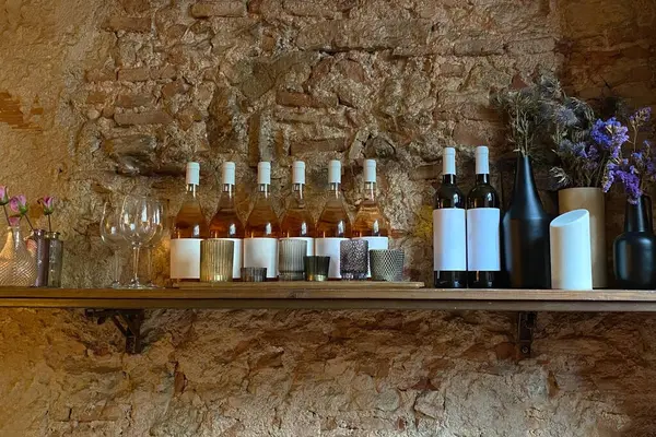 Wine bottles on a shelf in a wine shop, interior design