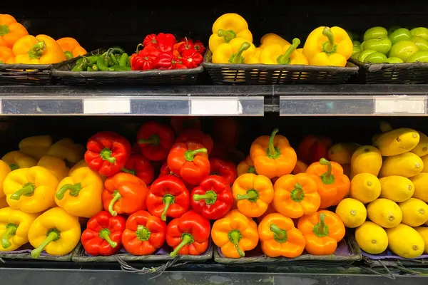 Colorful bell peppers on display at a market stall in the Netherlands