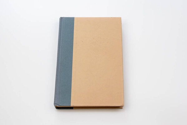 brown book on white background with clipping path and copy space.