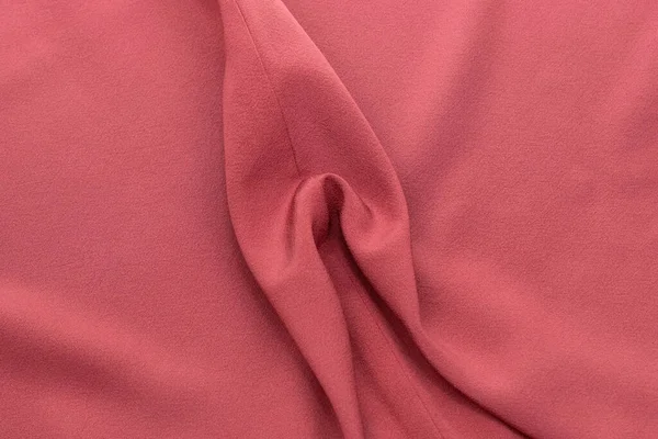 Female genital organs, vulva, vagina, delicate pink fabric sculpture, artistic depiction of feminine forms