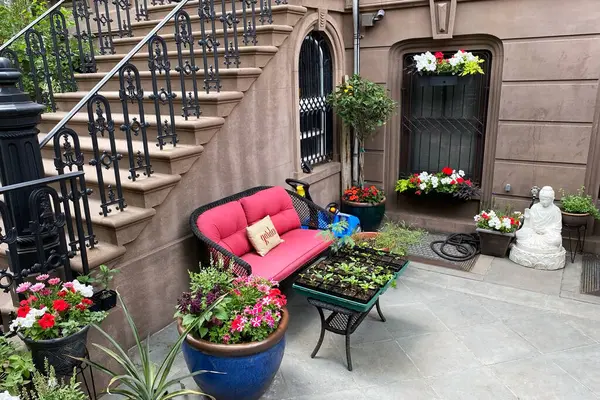 Garden with flowers in front of a house in New York City