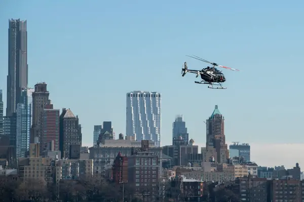 stock image U.S. Air Force Sikorsky S-70M flying over Lower Manhattan.
