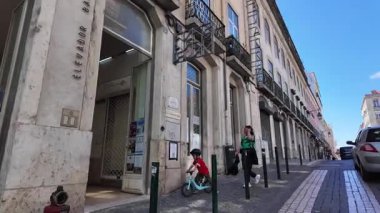 City POV Lisbon walk narrow street old town tourism Portugal