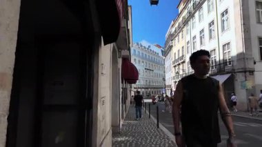 Lisbon street walk POV narrow travel shot Europe downtown