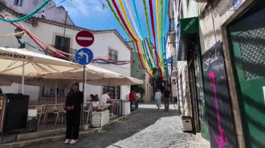 Exploring narrow Lisbon street POV city walk old European vibe