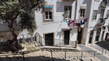 Europe trip scene Lisbon walk narrow alley POV old city