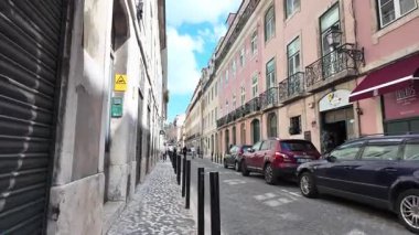 Exploring European city Lisbon walk POV narrow street urban feel