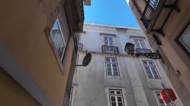 Lisbon Portugal walk POV travel scene through small alley