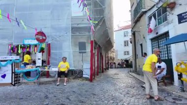 Parade and food culture at night in Lisbon for Saint Anthony