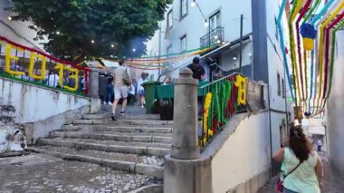 Lisbons festive Saint Anthony with food, lights and people