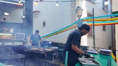 Traditional Lisbon parade with music and food for festival