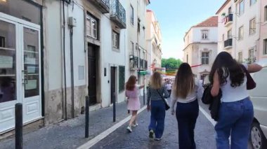Parade crowd and food stalls in Lisbon Saint Anthony night