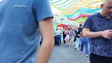 Happy Portugal crowd with dancing during Saint Anthony party