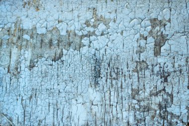 Boyası dökülen eski ahşap bir duvar. Arkaplan ve doku.