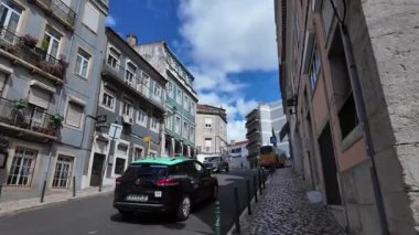 first person walk pov sunny Lisbon city Portugal architecture old buildings