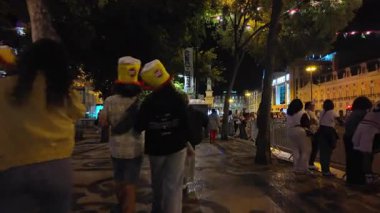 Exploring Lisbon nightlife on foot during a warm summer night