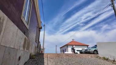 Portugal hiking trail on cliffs with blue ocean and wave crash