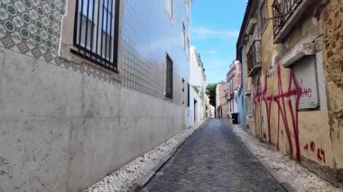 POV Lisbon street walk, summer vacation, sunny architecture, European travel destination